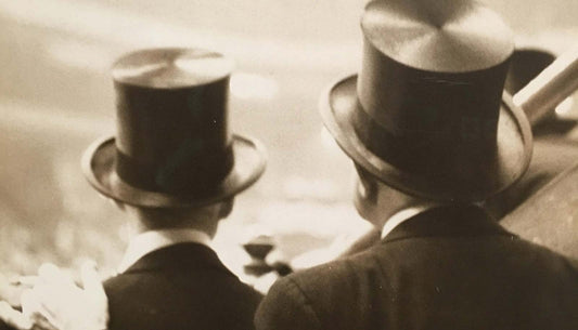 Men Wearing Top Hats In An Old Photo