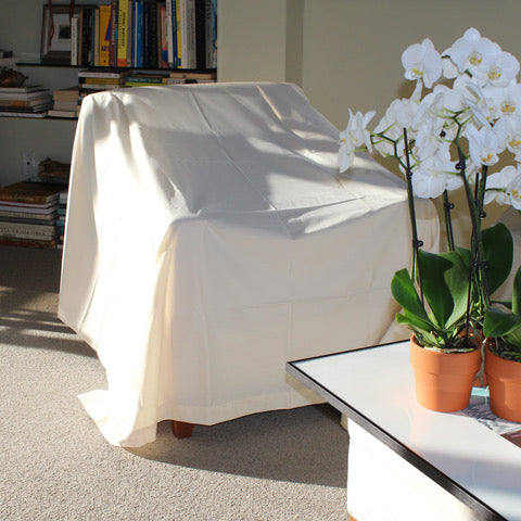 Cotton Furniture Dust Cover Over An Armchair